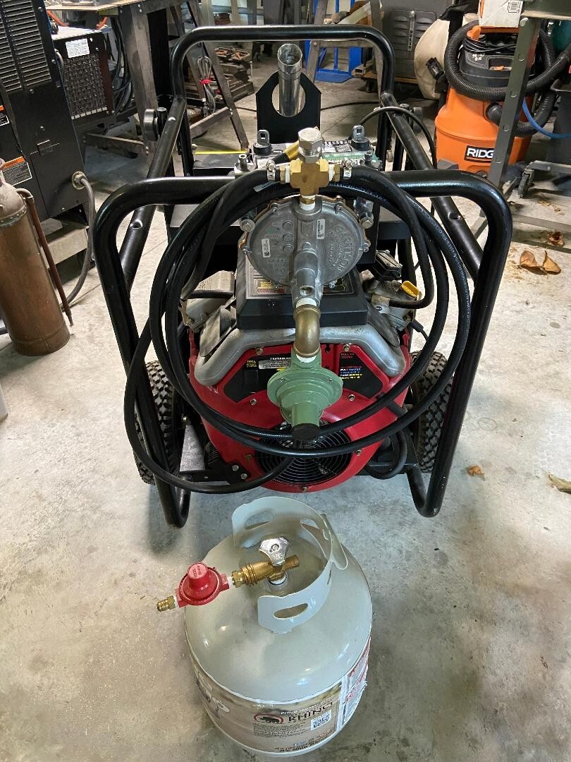generac 15000 watt propane generator with transfer switch and 2 batteries.