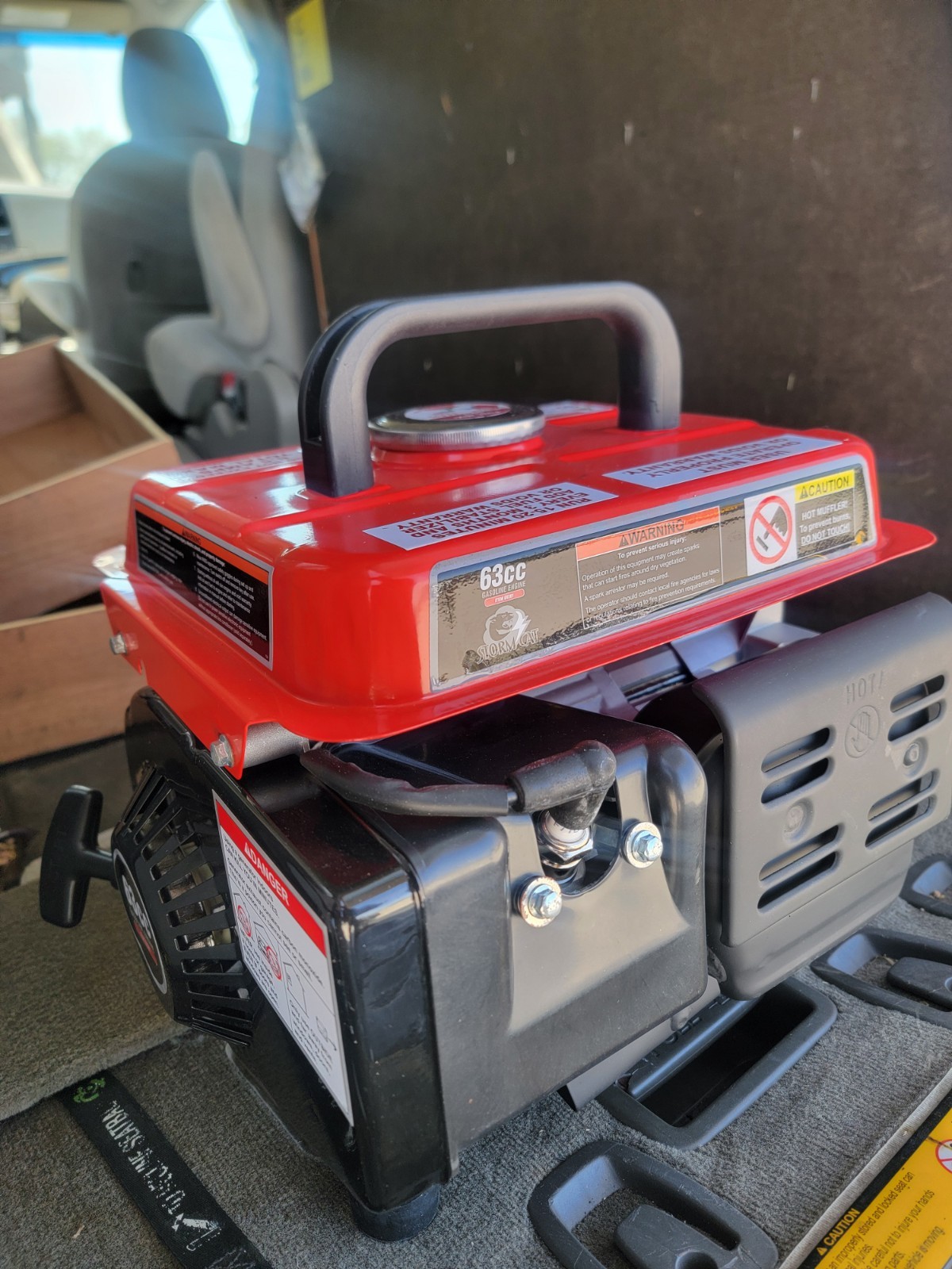 Watt Portable GeneratorIt features a two-stroke engine with 700 watts and 900
